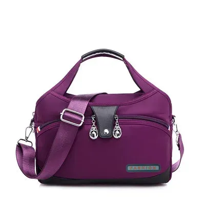 Versatile Voyager - Chic Waterproof Nylon Handbag