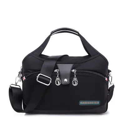 Versatile Voyager - Chic Waterproof Nylon Handbag